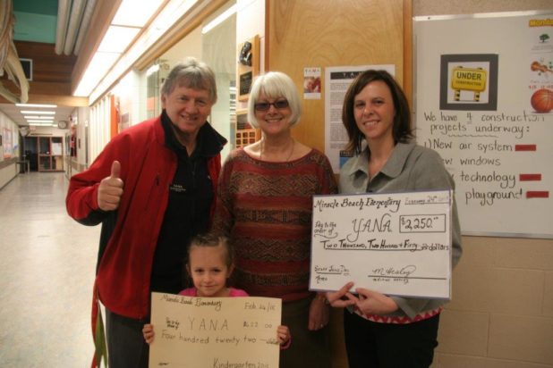 Hugh at Miracle Beach Elementary, proceeds from Jeans Day.